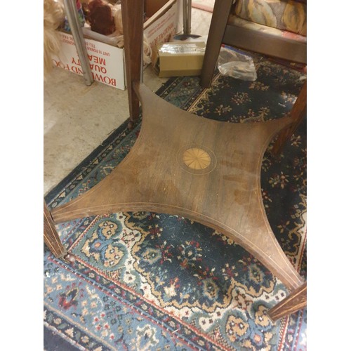 319 - A Edwardian Inlaid Hexagonal Table With Under Shelf And Caster Feet