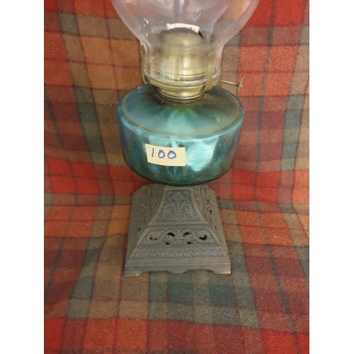 100 - A Victorian Oil Lamp With Cast Iron With Cast Iron Base And Blue Glass Oil Reservoir  Complete With ... 