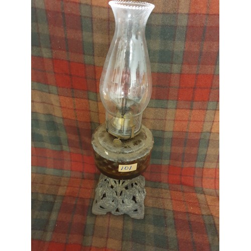 101 - A Victorian Oil Lamp With Clear Glass Reservoir Cast Iron Base Funnel And Wick