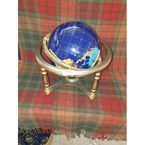 104 - A Large Semi Precious Stone World Globe On Brass Stand (32cm in height by 34cm in width)