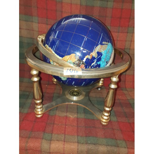 104 - A Large Semi Precious Stone World Globe On Brass Stand (32cm in height by 34cm in width)