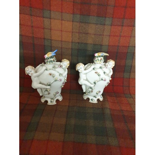 81 - A Pair Of Portuguese Pottery Cherub Drinks Flasks With Cherub Handles Bird Finial Stoppers