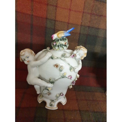 81 - A Pair Of Portuguese Pottery Cherub Drinks Flasks With Cherub Handles Bird Finial Stoppers