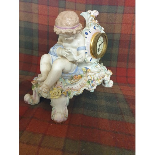 82 - A German 19th century porcelain Meissen Clock With Stunning Hand Pained Decoration With Cherub Readi... 