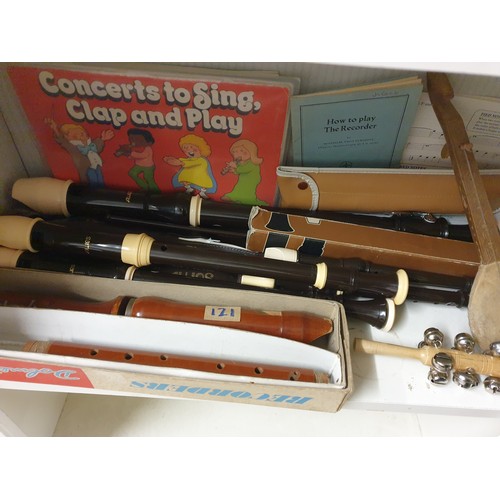 121 - A Shelf Of Musical Instruments includes Recorders & a selection of Music Sheets etc