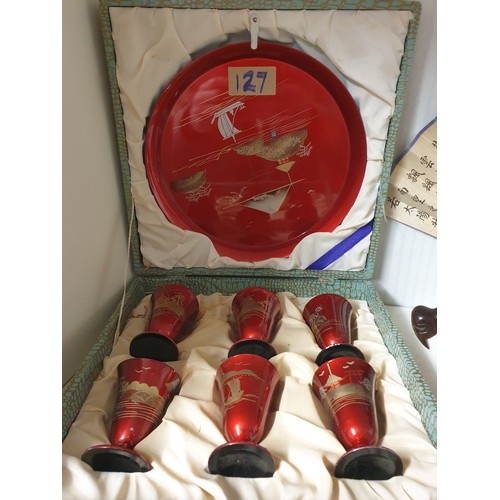 127 - A Selection Of Oriental Items Lacquered Drink Set, Oriental Boats On Stands And Small Figures