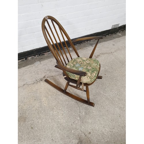 201 - A Beautiful Little Ercol Wheel Bach Rocking Arm Chair