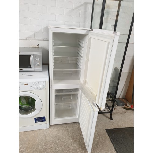 254 - A Slimline Fridge Freezer