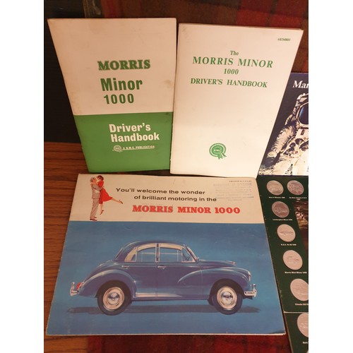 139 - A Selection Of Collectors Morris Minor Car Related Items  Coin Sets And 2 Haines Car Manuals Etc