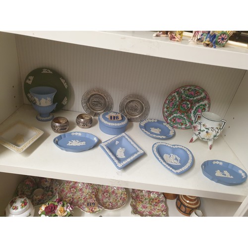 118 - A Shelf Of collectables to include Wedgwood & Continental Silver Napkin Rings