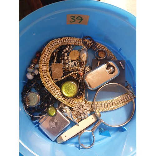 39 - A Box Of Costume Jewellery, Pen Knife, Lighter, and a Magnifying Glass etc