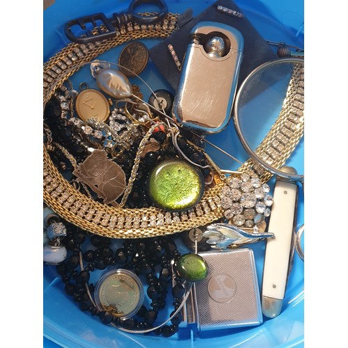 39 - A Box Of Costume Jewellery, Pen Knife, Lighter, and a Magnifying Glass etc