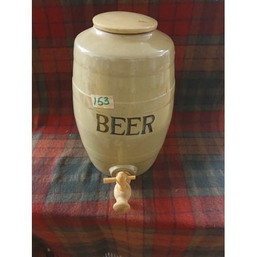 153 - A Large Stoneware Beer Barrel With Wooden Tap And Lid Cover