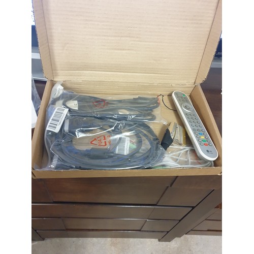 267 - A LG 26 Inch Flat Screen TV With Accessory Pack And Remote