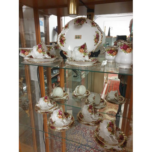 44 - A Royal Albert 21 Piece Tea Set With 2 Spare Cups 6 Piece Setting With Cake Plate Sugar And Cream