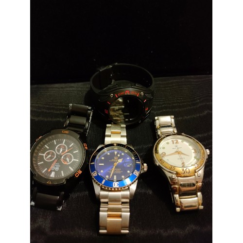 21 - A collection four of gents watches ( 2 in working order)