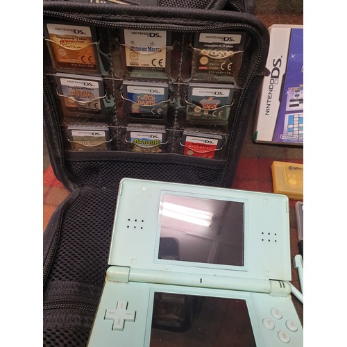 148D - Ninteno DS With Loads Of Games And Carry Bag