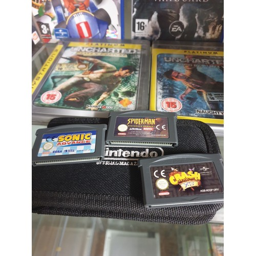 186 - PS2 Games , PS3 Games And 3 Nintendo DS Games In A Wallet