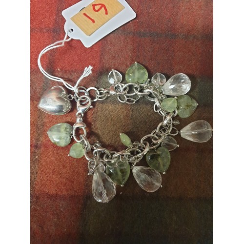 19 - A Quality heavy silver 925 hall marked charm bracelet