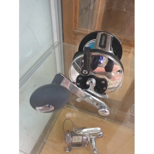 58 - Aihua GFW 5000 Multiplier Reel With Line