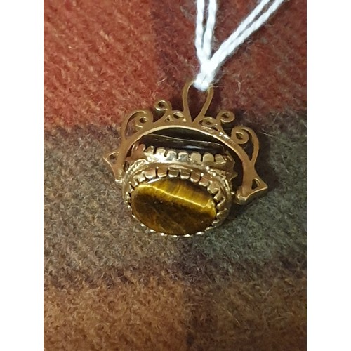 3 - 9ct Gold Triple Stone Revolving Fob