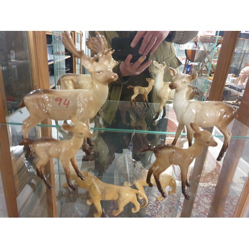 94 - A Beswick Deer Family Stag Doe And 2 Fawns