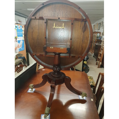 266 - Large Reproduction Flip Top Table With Inlaid Top And Brass Caster Feet