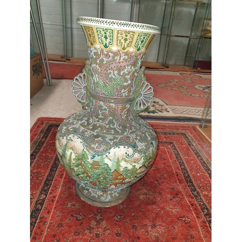 87 - A large Chinese 19th century vase depicting pagoda scene [ damage to the base ]