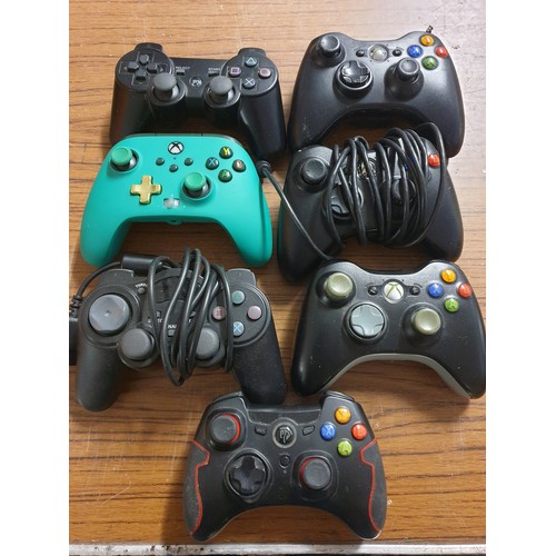 169 - Selection Of Gamers Hand Controllers And 2 Vintage Games