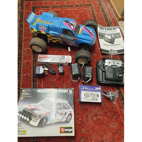 164 - Remote Control Rally Car With Remote And Accessories And Burago Model Car Kit Boxed