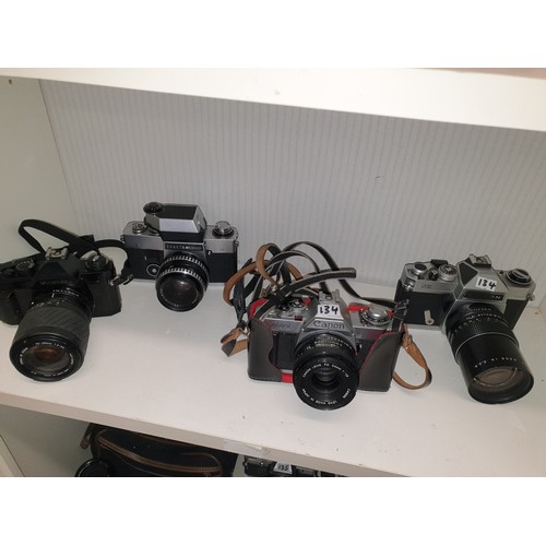 134 - Shelf Of Assorted Cameras Canon Miranda Chinon etc