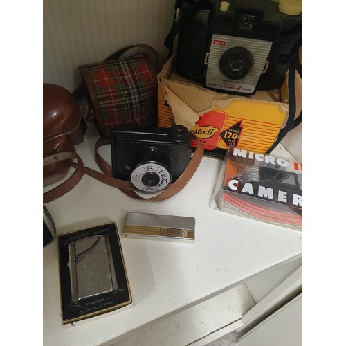 135A - Shelf Of Vintage Cameras , Lighters, Tie Press And Cigarette Case