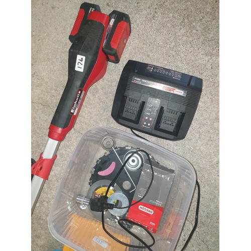 176 - Huge Heavy Cordless Duty Strimmer With Charger Spare Metal Blades And Accessories