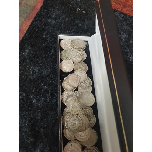 39 - Approximately 62 Silver Three Penny Pieces