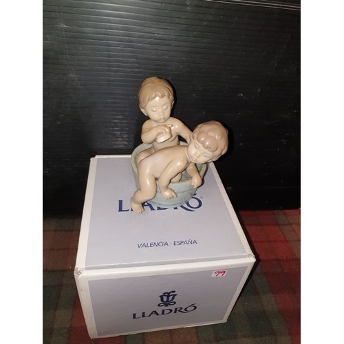 99 - A Lladro Figure 'bathtime' with Box