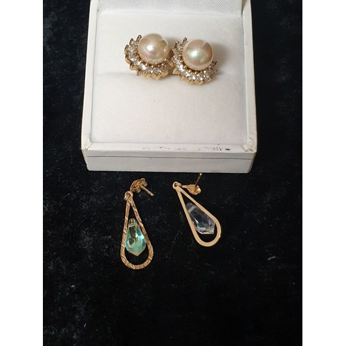 30 - A Pair of silver & mother of pearl Ear Rings  with czs stones together with 9ct gold earrings