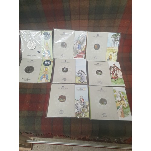 9L - 2 Royal Mint Peter Rabbit £5 Coins And 6 Winnie The Pooh 50p Coins Mint And Sealed With Certificates