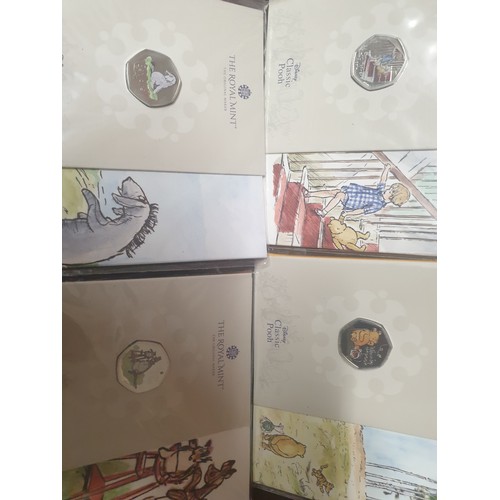 9L - 2 Royal Mint Peter Rabbit £5 Coins And 6 Winnie The Pooh 50p Coins Mint And Sealed With Certificates