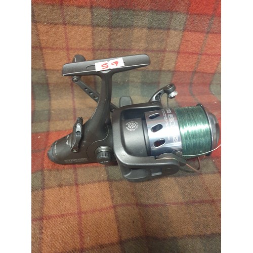 65 - Shimano Bait Runner Spinning Reel With Line