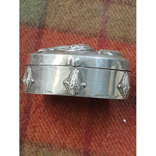 12 - Top Quality Silver Snuff Box With Raised Fish Decoration To Top With Floral Decoration To Front