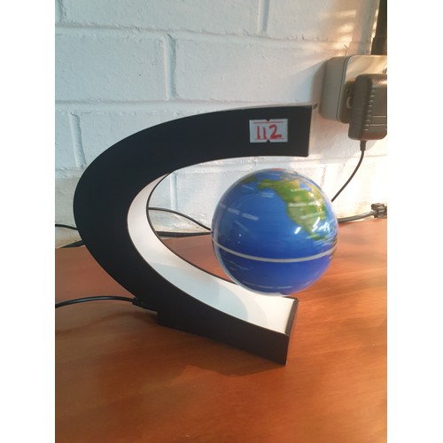 112 - Magnetica Floating Revolving World Globe Complete With Stand