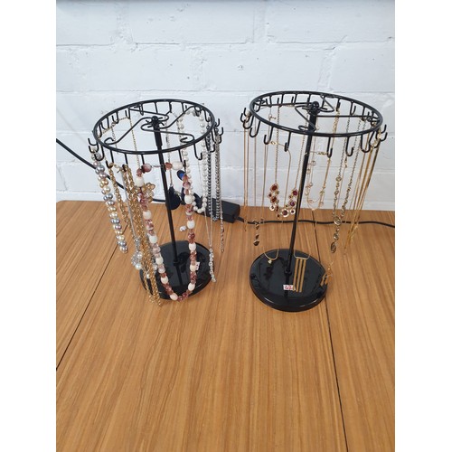 62 - 2 New Carousel Stands Of Costume Jewellery Stands Included