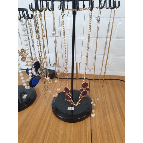 62 - 2 New Carousel Stands Of Costume Jewellery Stands Included