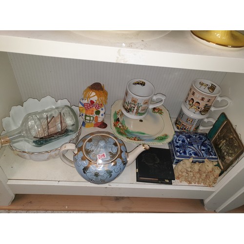 208 - 2 Shelves Of Collectables Doulton, Nao, Maling Ringtons, Delft And Ship In A Bottle etc