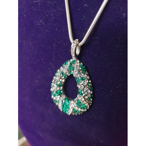 34 - A Silver Necklace With Green Stone Large Pendant