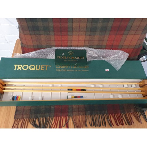 128 - A vintage Carpet Croquet Set in fitted box