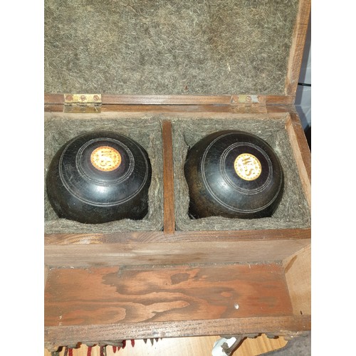 210 - A selection of collectables; Carved Tray, Horn, Brass Burner African Busts And Pair Of Bowling Boule... 