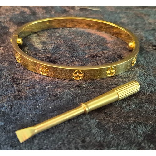 50F - Vintage designer style bangle with small [screw driver tool]