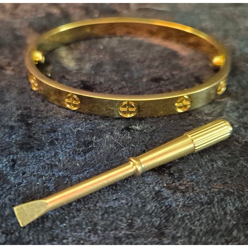 50F - Vintage designer style bangle with small [screw driver tool]