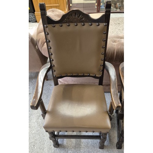 239 - A Pair of 1900s Oak arm chairs with leather upholstery